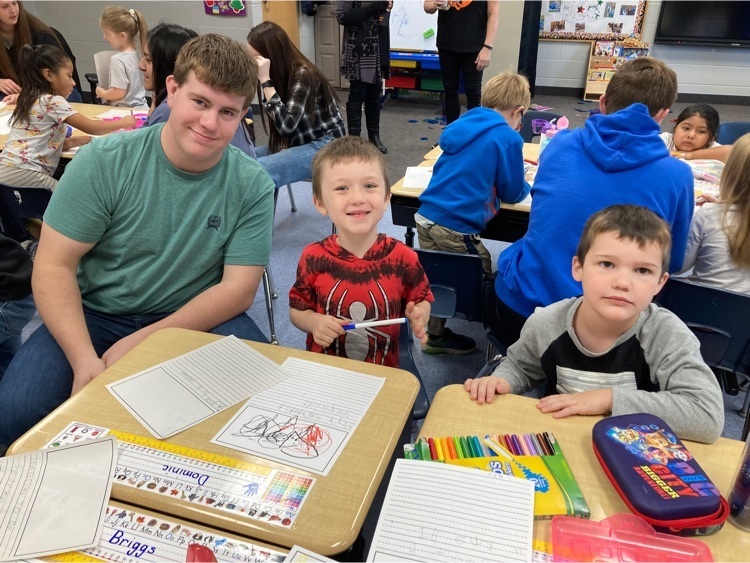 TJ helps two young Kindergartners !